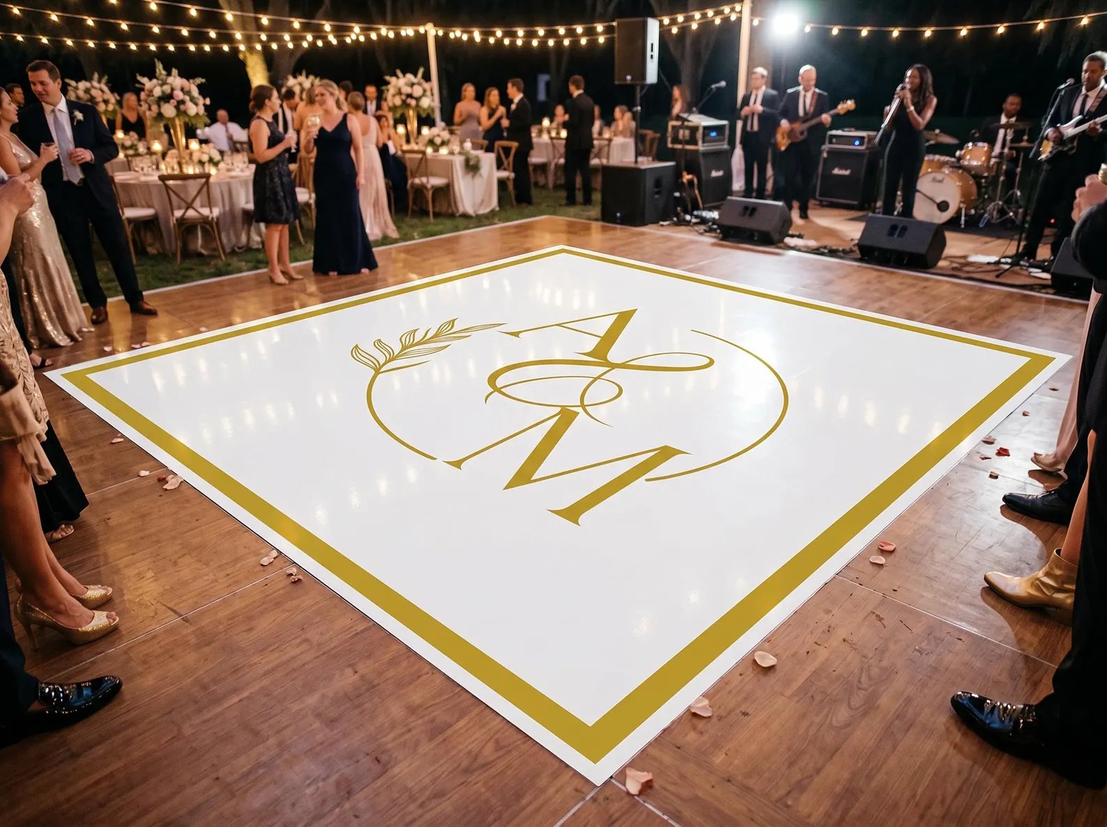 Custom printed vinyl wrap dance floor with couple's initials at a Salt Lake City wedding