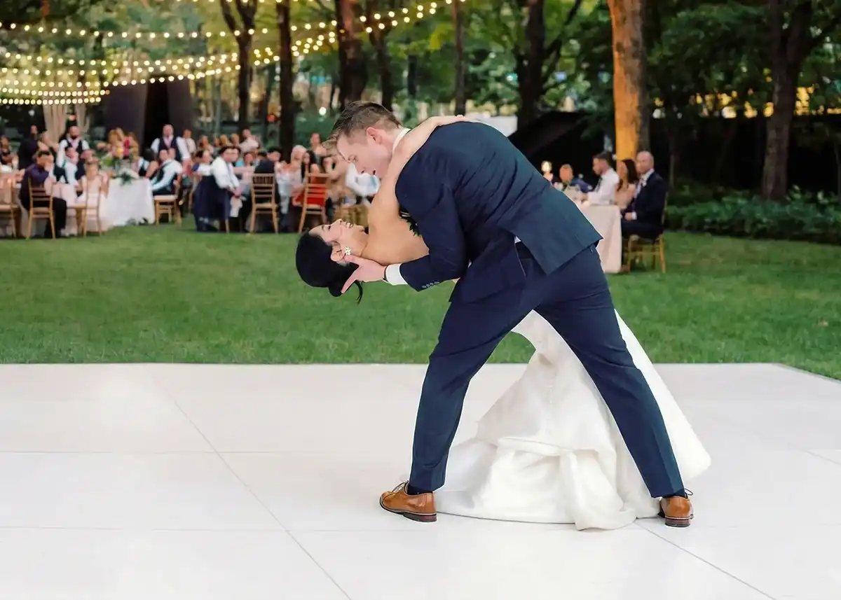 All white dance floor set up at an outdoor garden wedding reception near Salt Lake City